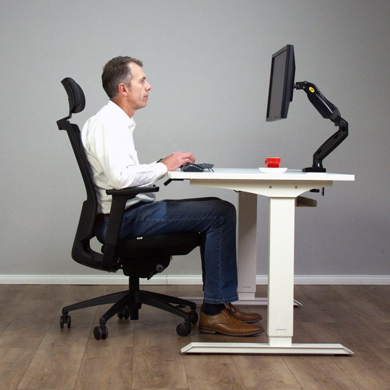 monitor and ergonomic chair and desk setup